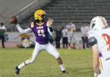 Lemoore quarterback Ty Chambers performed well against Porterville Friday night. He and the Tigers travel to Redwood for the WYL opener Friday night.